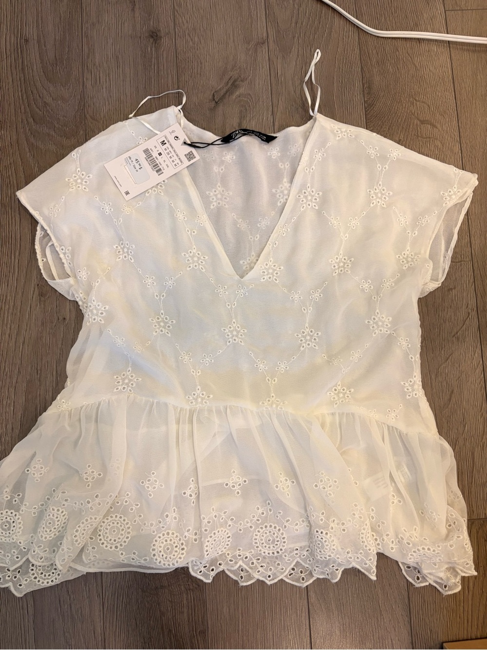 Lightweight White Eyelet V-Neck Peplum Top